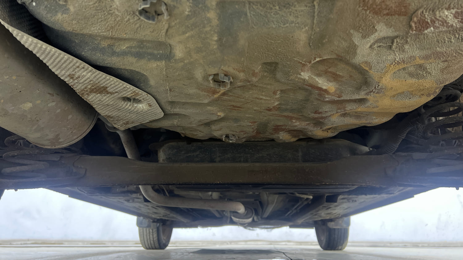 Used 2025 Nissan Magnite Tekna Plus HRAO 1.0 Turbo Petrol MT Petrol Manual extra REAR UNDERBODY VIEW (TAKEN FROM REAR)
