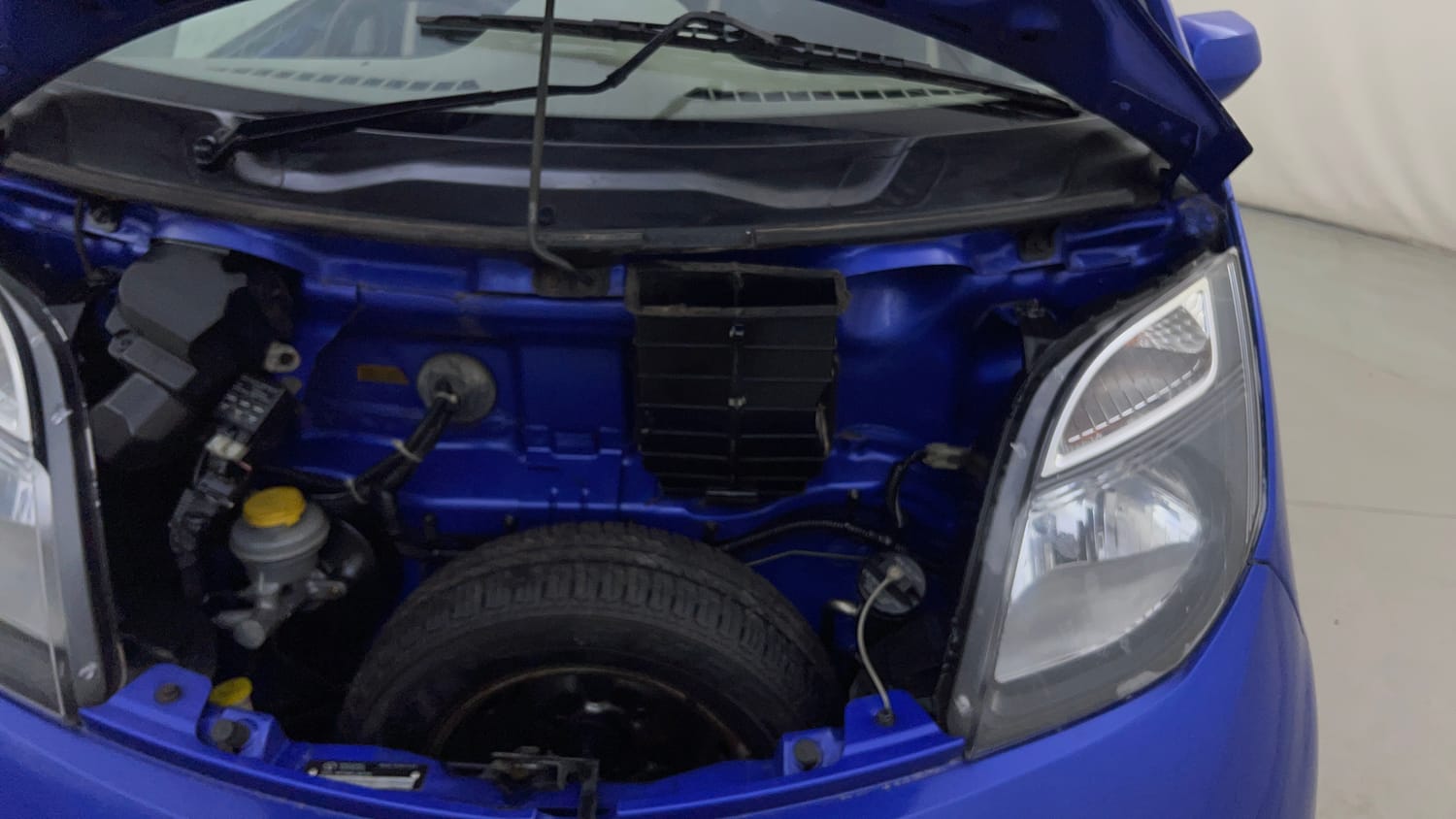 Used 2016 Tata Nano Twist XT Petrol Manual engine ENGINE LEFT SIDE HINGE & APRON VIEW