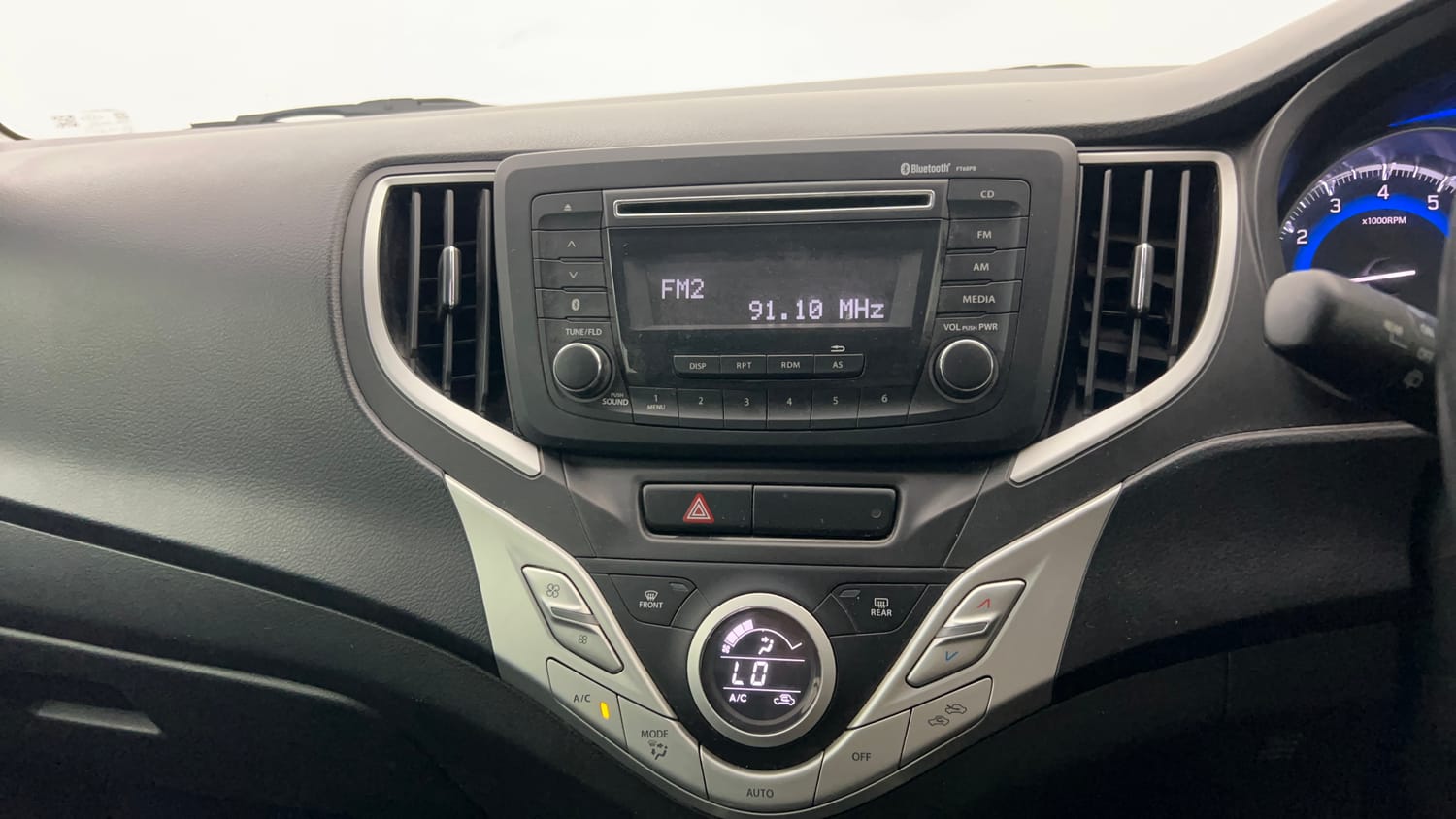 Used 2016 Maruti Suzuki Baleno Zeta 1.2 Petrol Manual interior MUSIC SYSTEM & AC CONTROL VIEW
