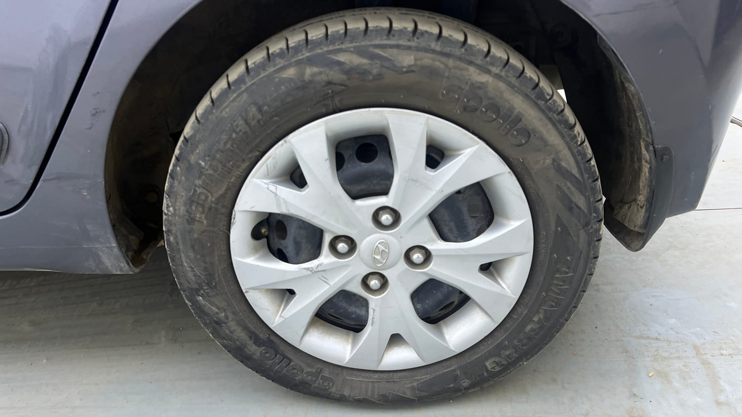 Used 2015 Hyundai Grand i10 Sportz 1.2 Kappa VTVT Petrol Manual tyres LEFT REAR TYRE RIM VIEW