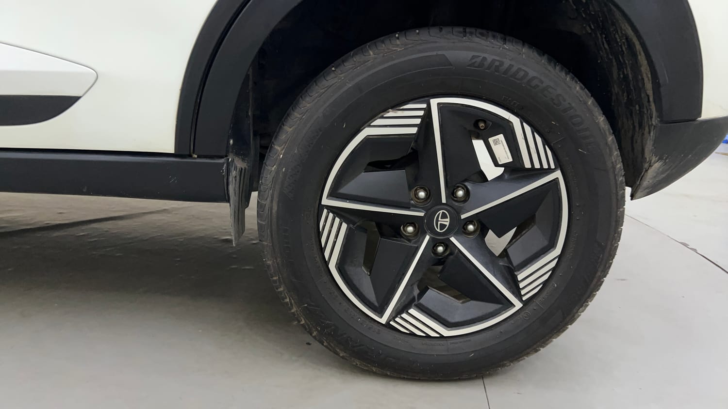 Used 2024 Tata Nexon Fearless 1.2 Revotron Petrol 6MT DT Petrol Manual tyres LEFT REAR TYRE RIM VIEW