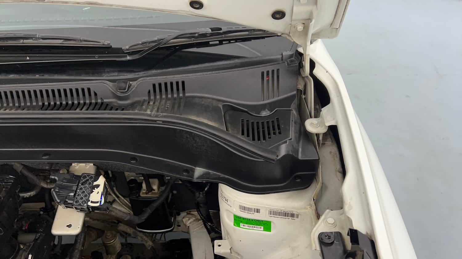 Used 2022 Tata Punch Pure MT Petrol Manual engine ENGINE LEFT SIDE HINGE & APRON VIEW