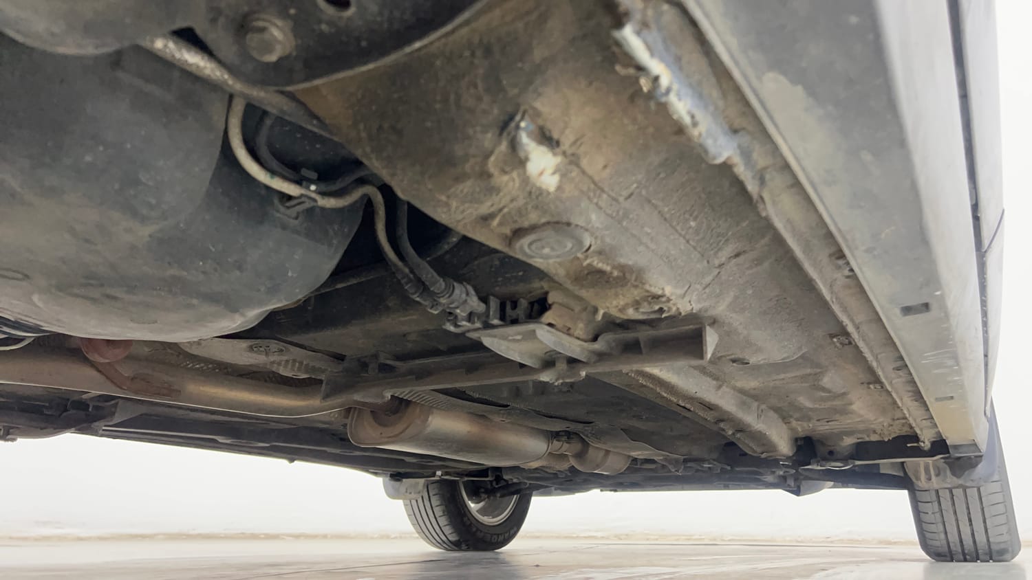 Used 2025 Volkswagen Taigun Highline 1.0 TSI MT Petrol Manual extra REAR RIGHT UNDERBODY VIEW