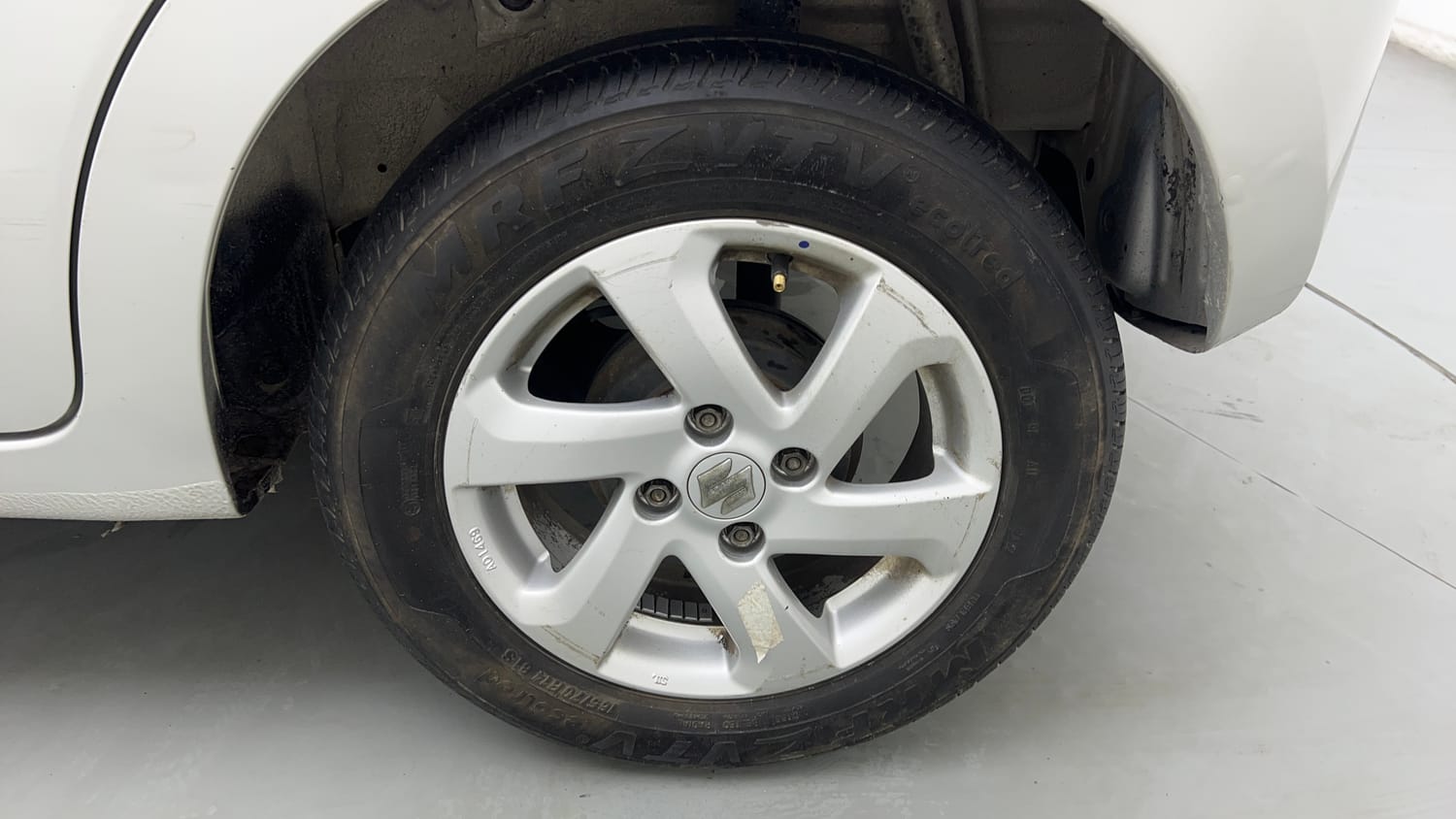 Used 2014 Maruti Suzuki Celerio VXi AMT Petrol Automatic tyres LEFT REAR TYRE RIM VIEW