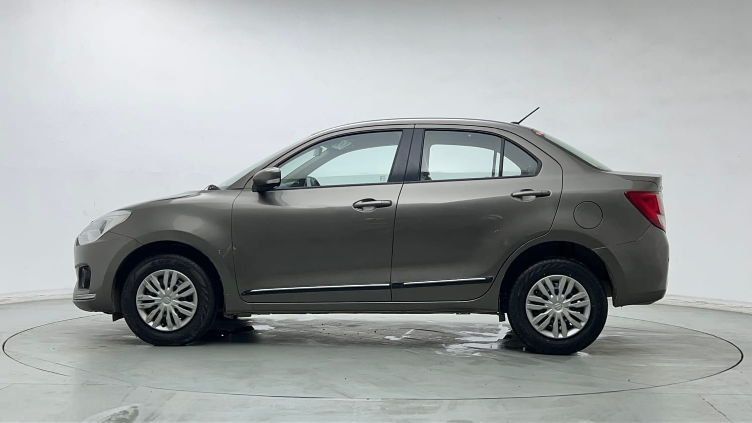 Used 2020 Maruti Suzuki Dzire VXi Petrol Manual exterior LEFT SIDE VIEW