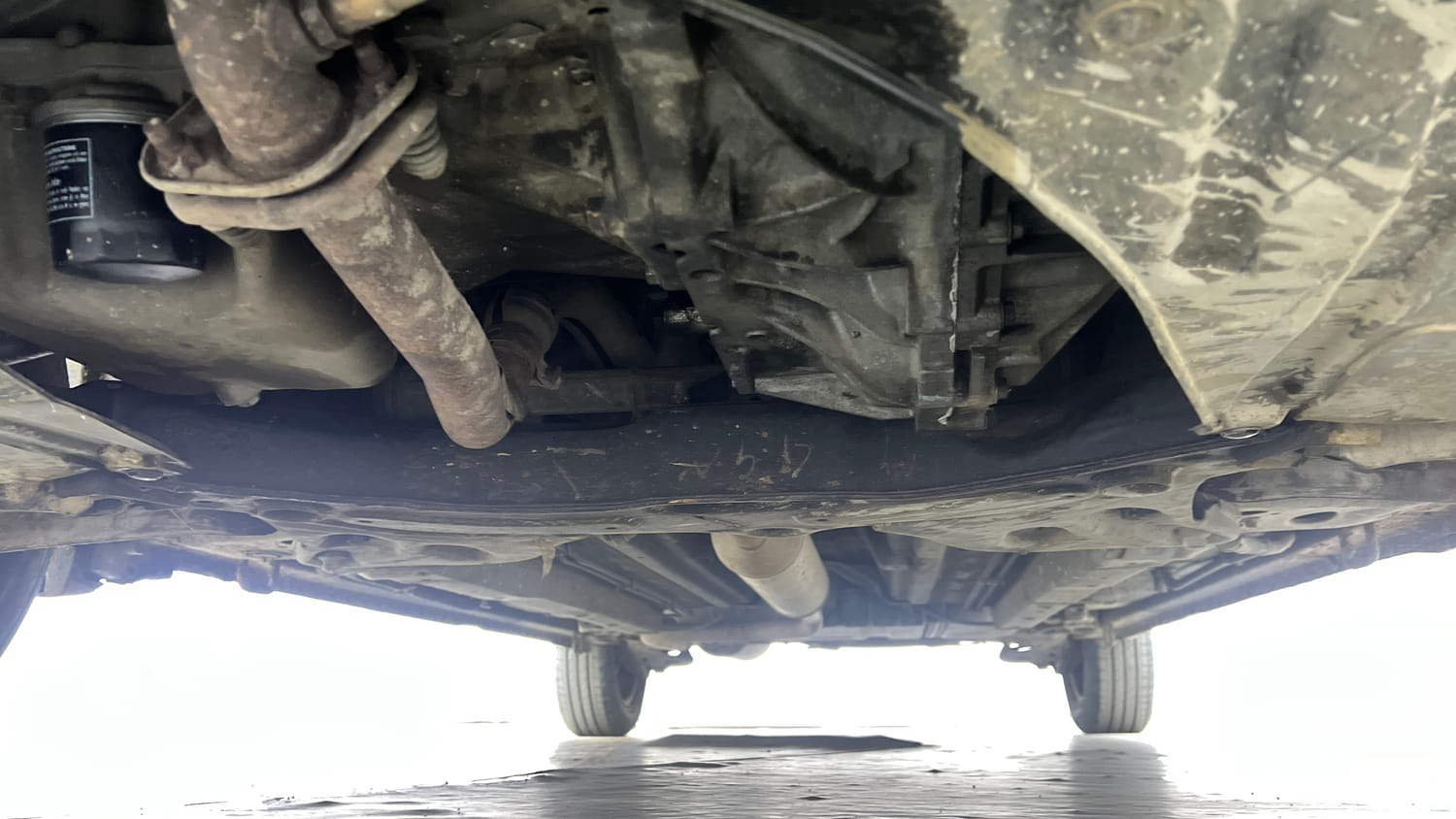 Used 2013 Maruti Suzuki Ertiga Vxi Petrol Manual extra FRONT LEFT UNDERBODY VIEW