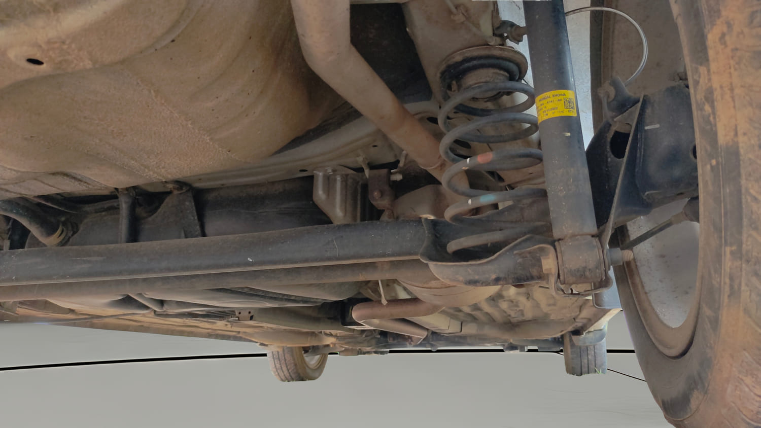 Used 2022 Honda Amaze VX CVT 1.2 Petrol Petrol Automatic extra REAR RIGHT UNDERBODY VIEW