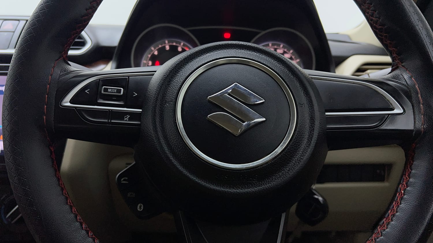 Used 2020 Maruti Suzuki Dzire VXi Petrol Manual top_features Steering mounted controls