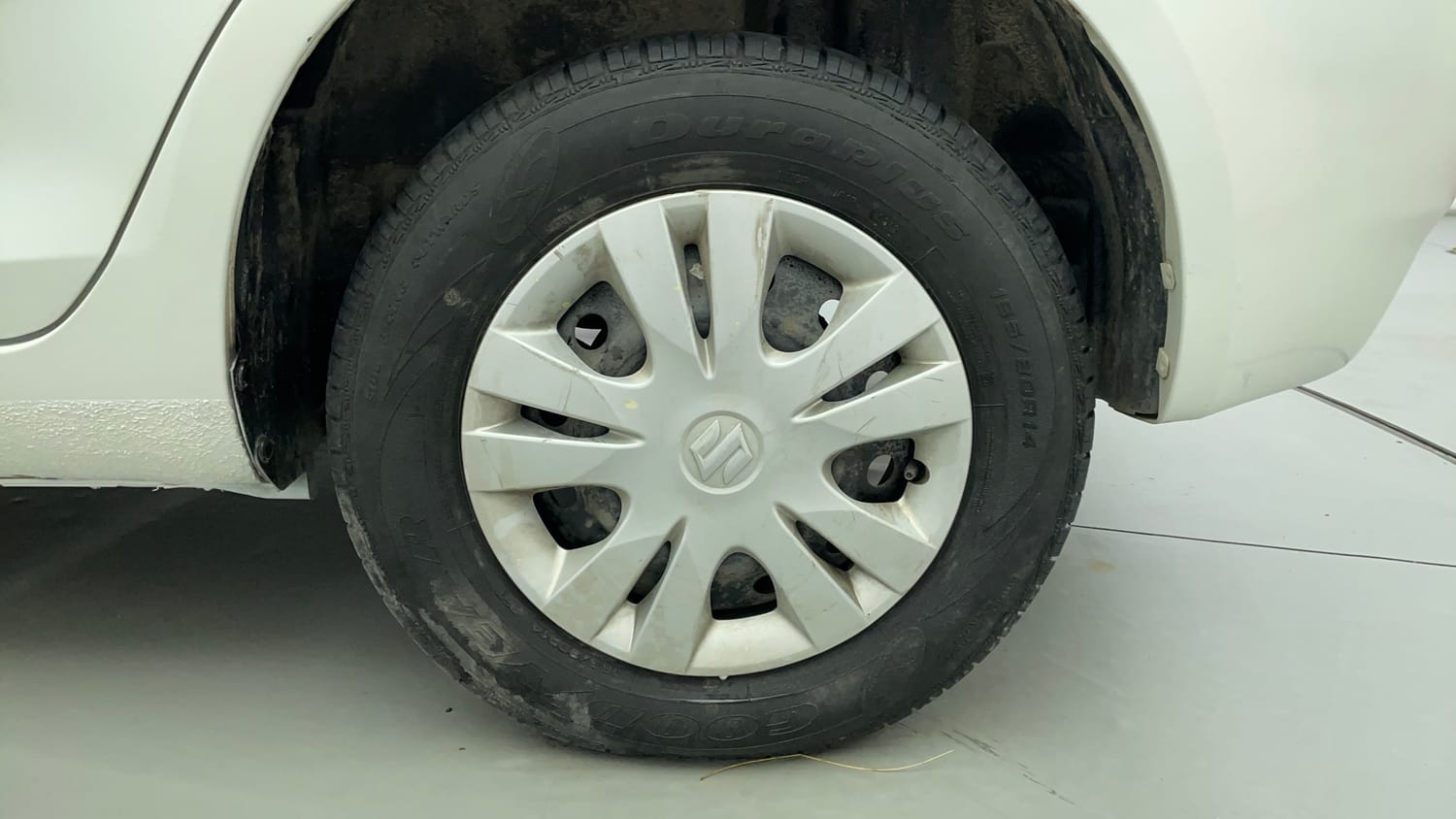 Used 2013 Maruti Suzuki Swift Dzire VXI Petrol Manual tyres LEFT REAR TYRE RIM VIEW