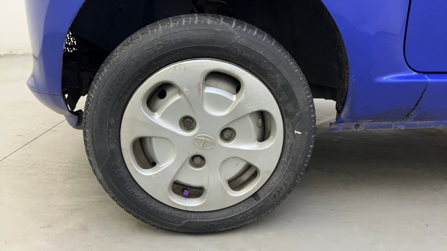 Used 2016 Tata Nano Twist XT Petrol Manual tyres LEFT FRONT TYRE RIM VIEW