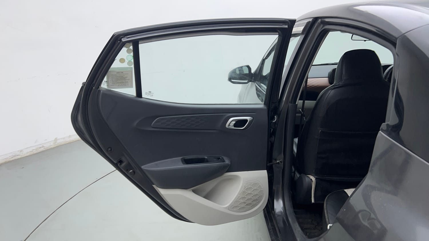 Used 2023 Hyundai Aura SX 1.2 CNG Cng Manual interior LEFT REAR DOOR OPEN VIEW