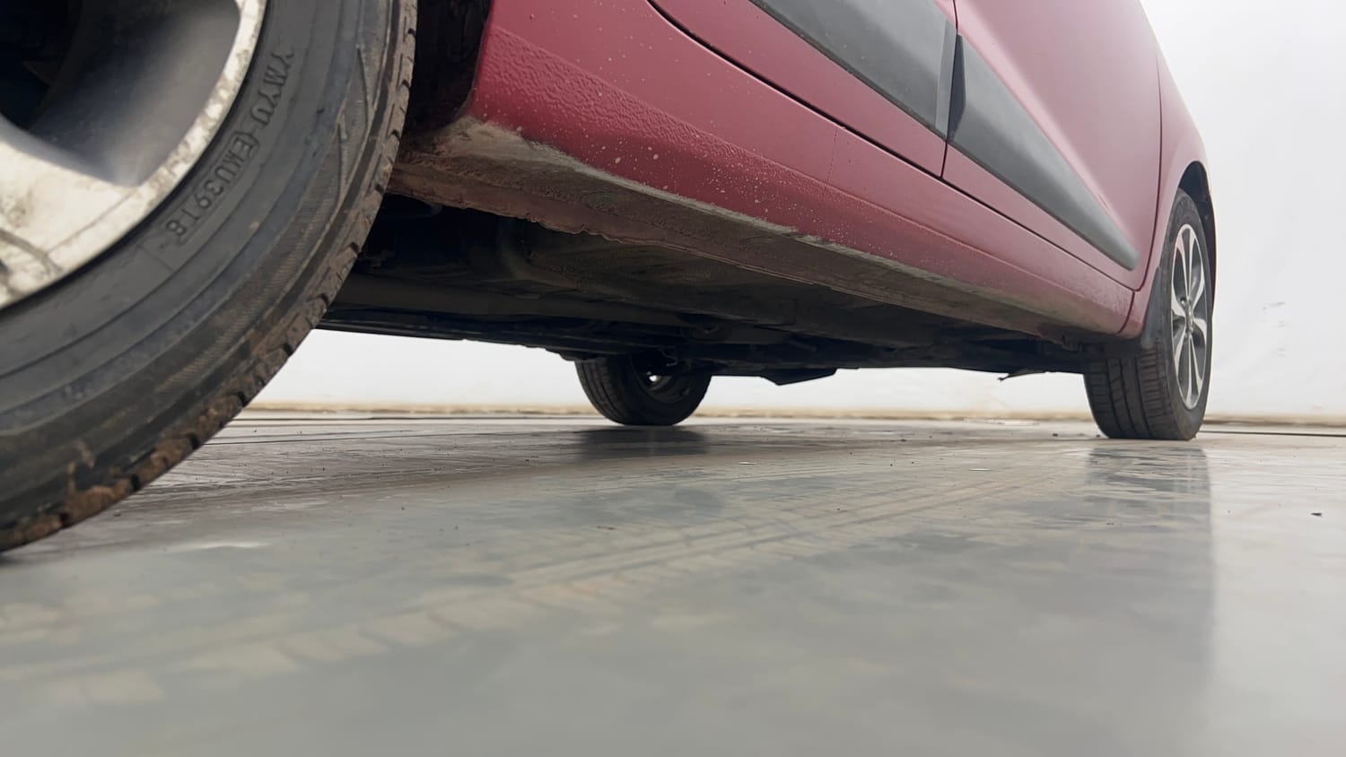 Used 2014 Hyundai Xcent SX 1.2 (O) Petrol Manual extra REAR RIGHT UNDERBODY VIEW