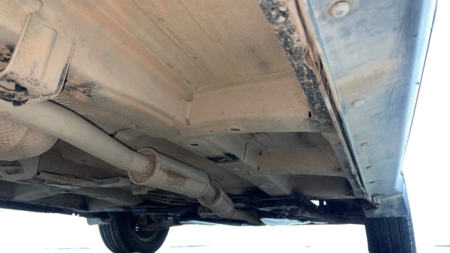 Used 2016 Mahindra KUV100 K6+ 6 STR Petrol Manual extra REAR RIGHT UNDERBODY VIEW