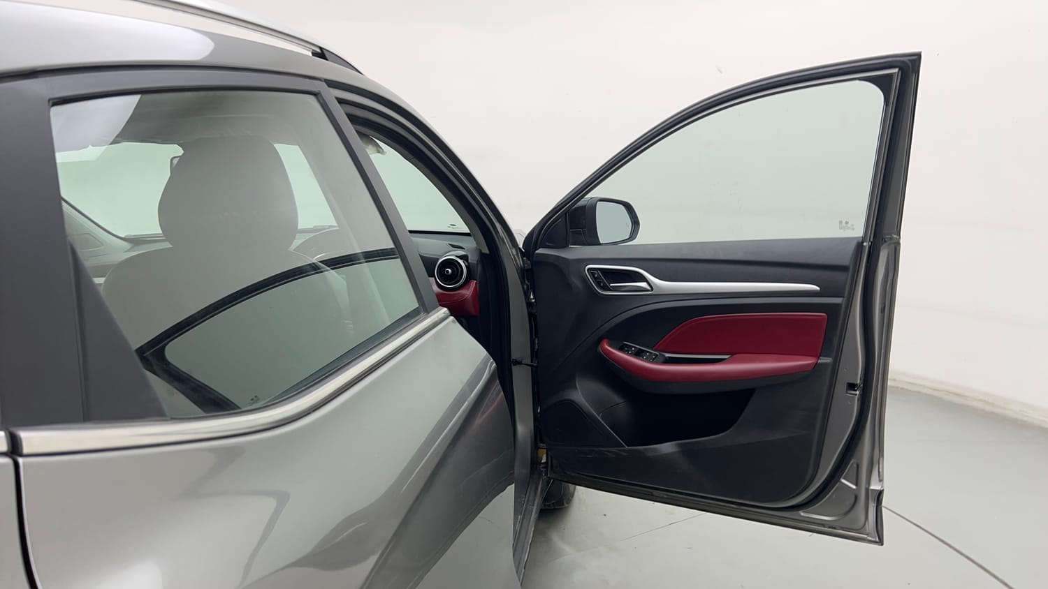 Used 2023 MG Motors Astor Savvy 1.3 Turbo AT S Red Petrol Automatic interior RIGHT FRONT DOOR OPEN VIEW