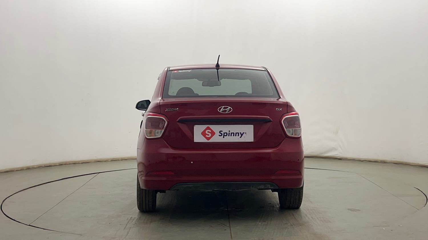 Used 2014 Hyundai Xcent SX 1.2 (O) Petrol Manual exterior BACK VIEW