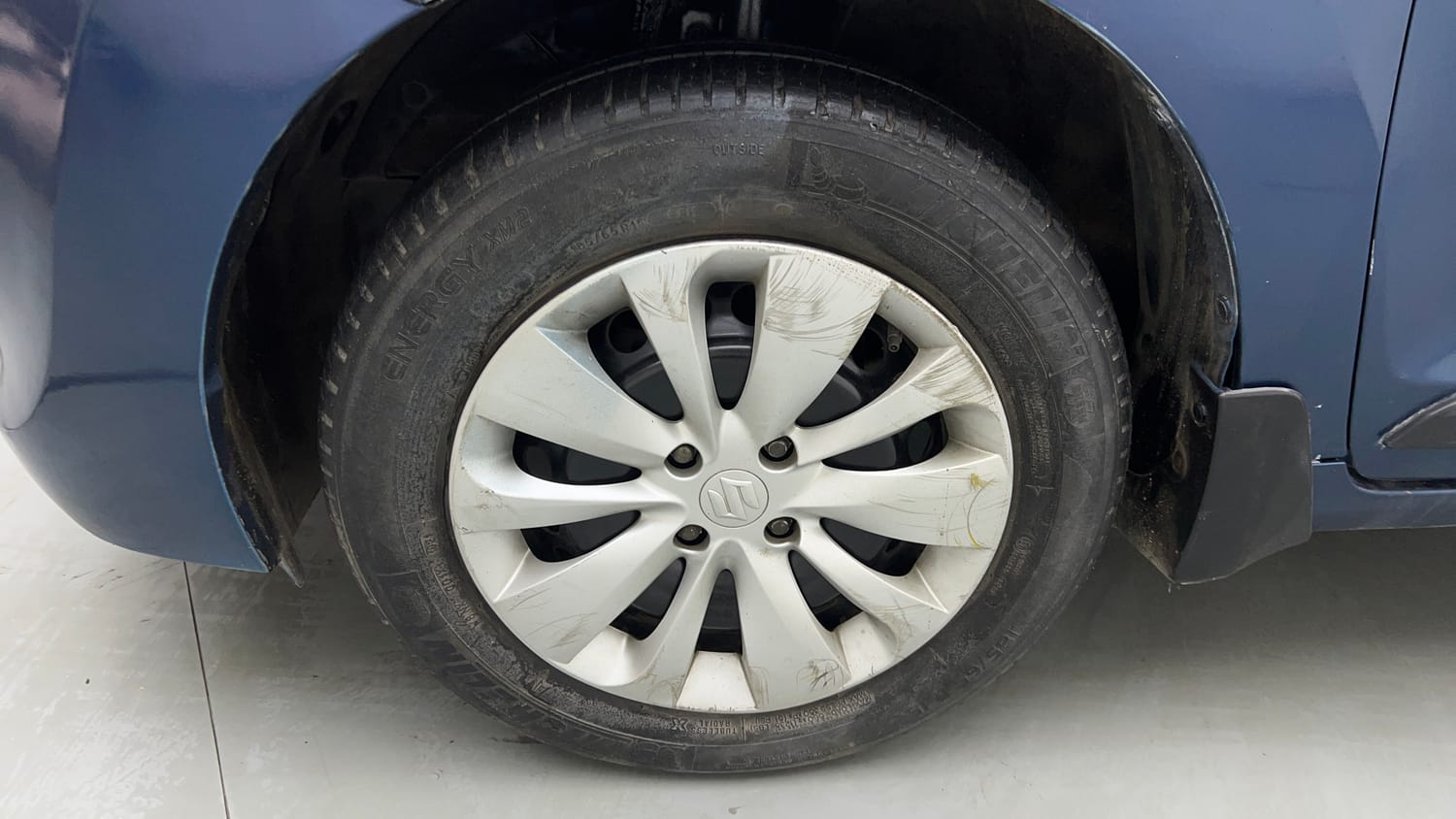 Used 2017 Maruti Suzuki Baleno Delta 1.2 Petrol Manual tyres LEFT FRONT TYRE RIM VIEW