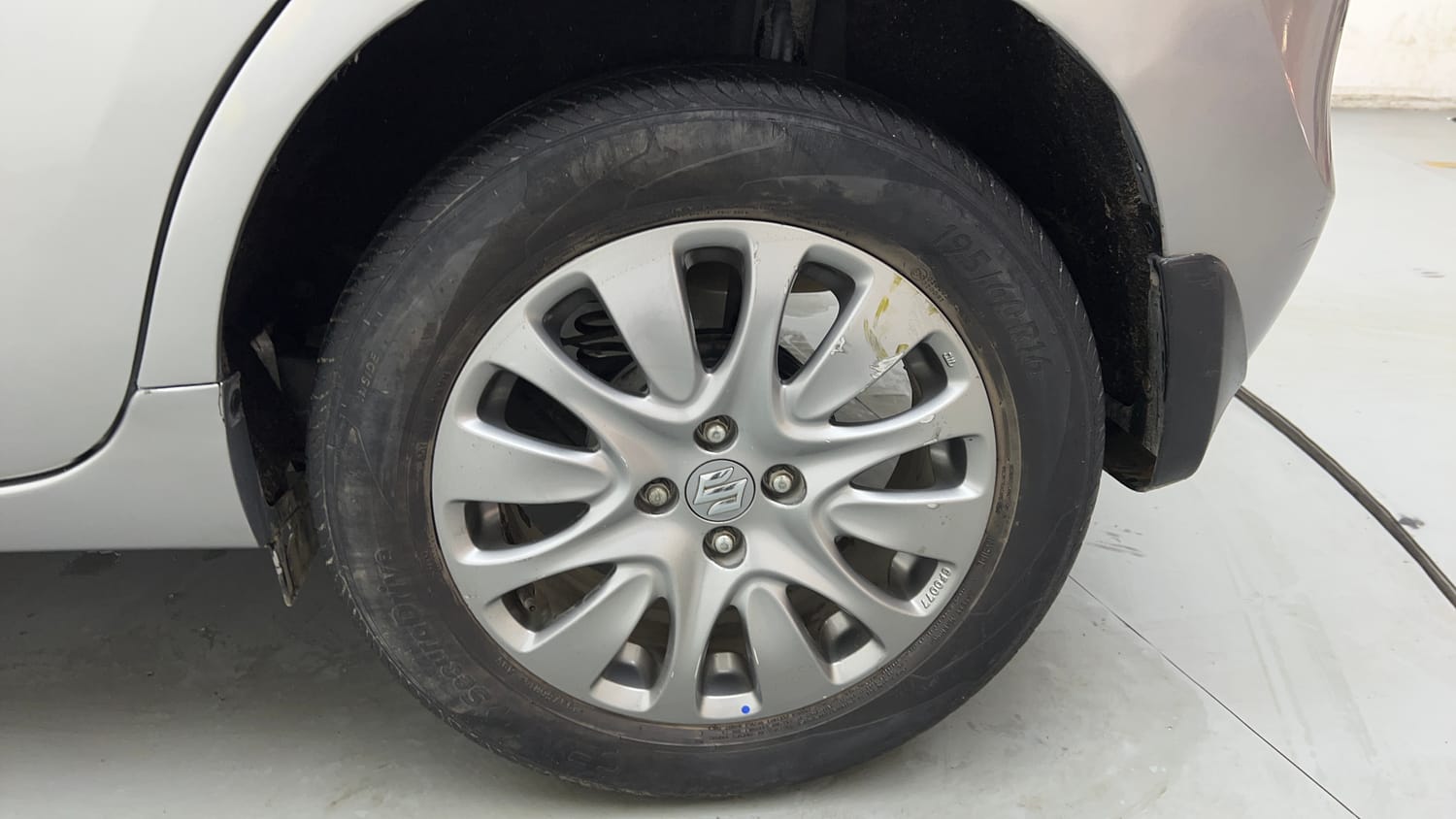 Used 2018 Maruti Suzuki Baleno Delta 1.2 Petrol Manual tyres LEFT REAR TYRE RIM VIEW