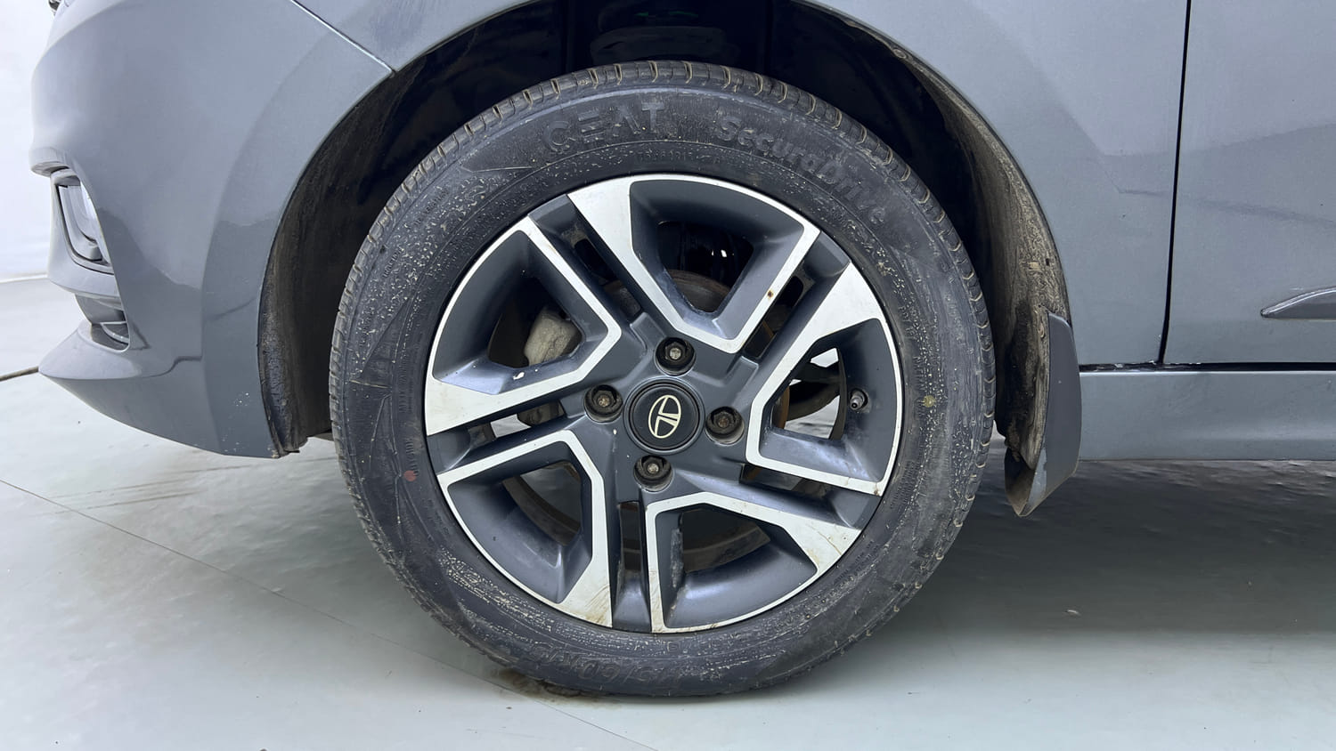 Used 2021 Tata Tiago XZ Plus Petrol Manual tyres LEFT FRONT TYRE RIM VIEW
