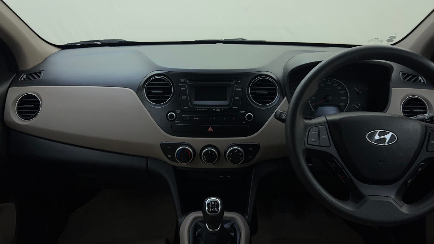 Used 2015 Hyundai Grand i10 Sportz 1.2 Kappa VTVT Petrol Manual interior MUSIC SYSTEM & AC CONTROL VIEW