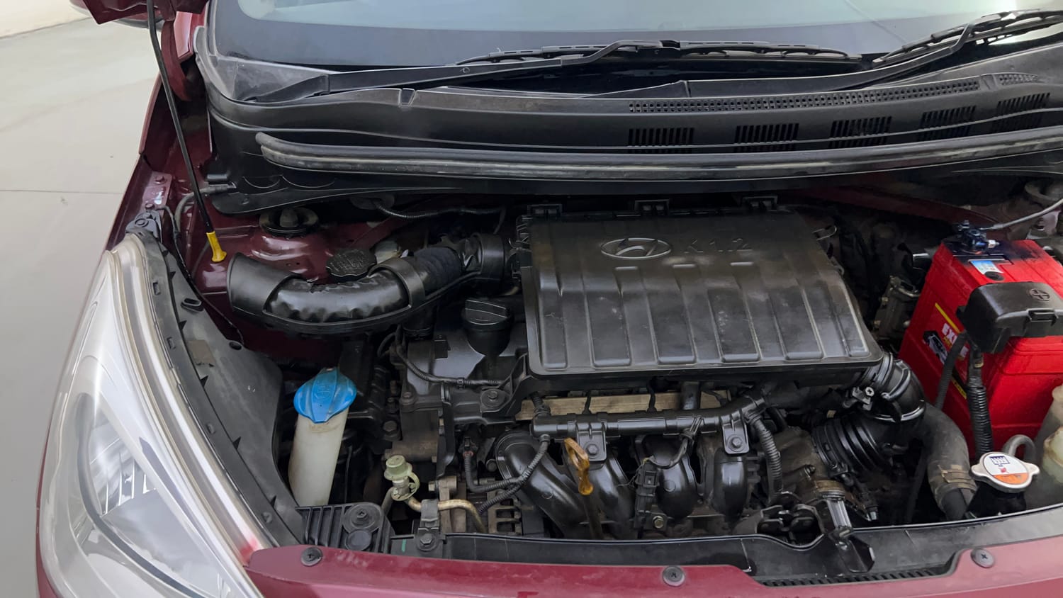 Used 2015 Hyundai Grand i10 Sportz 1.2 Kappa VTVT Petrol Manual engine ENGINE RIGHT SIDE HINGE & APRON VIEW