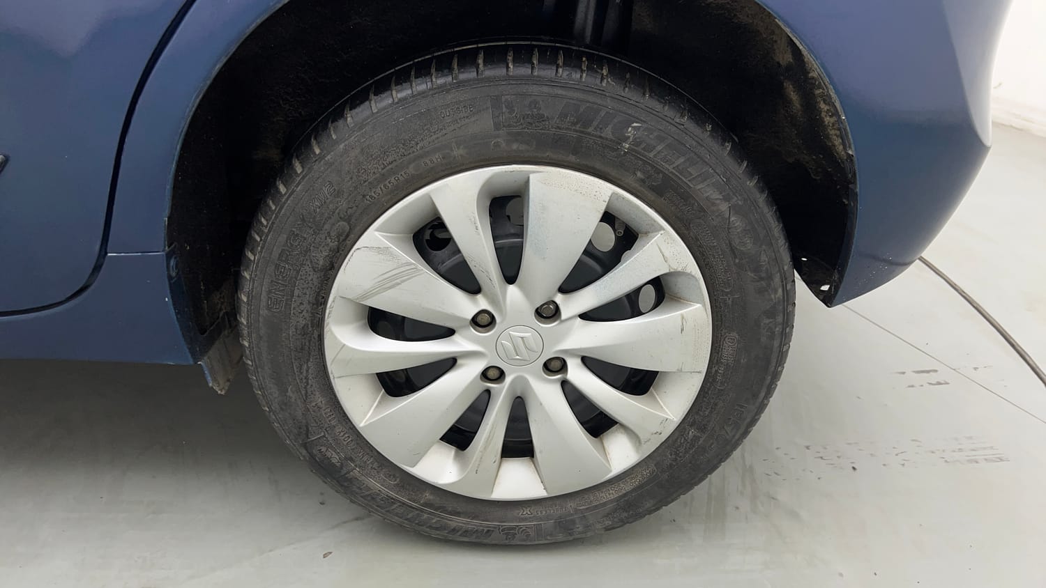 Used 2017 Maruti Suzuki Baleno Delta 1.2 Petrol Manual tyres LEFT REAR TYRE RIM VIEW