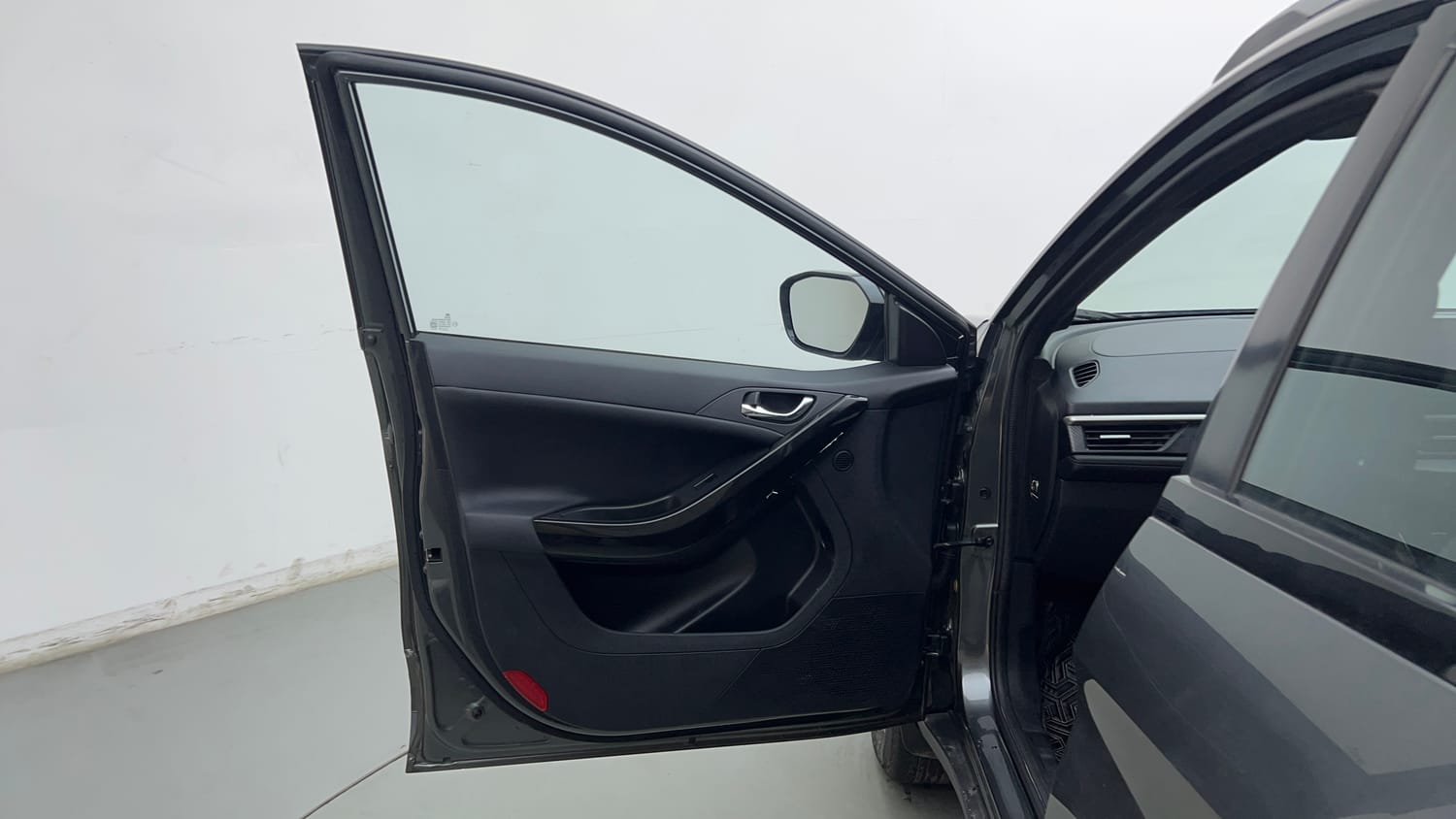 Used 2024 tata Nexon Fearless S 1.2 Revotron Petrol 7DCA Dual Tone Petrol Automatic interior LEFT FRONT DOOR OPEN VIEW