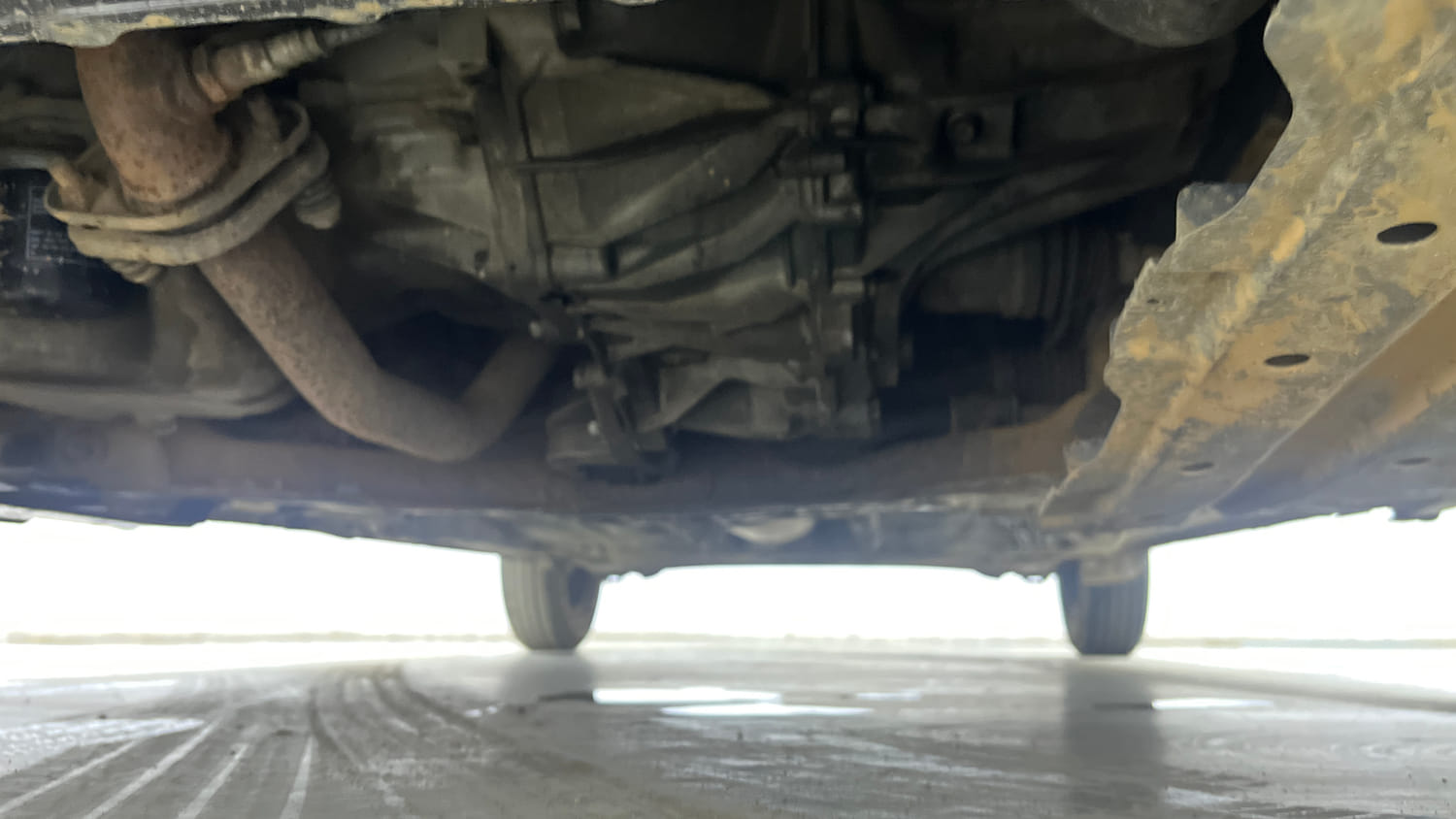 Used 2018 Maruti Suzuki Swift VXi AMT Petrol Automatic extra FRONT LEFT UNDERBODY VIEW