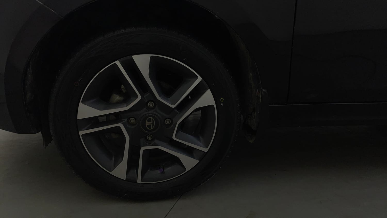 Used 2023 Tata Tiago XZ Plus Petrol Manual tyres LEFT FRONT TYRE RIM VIEW