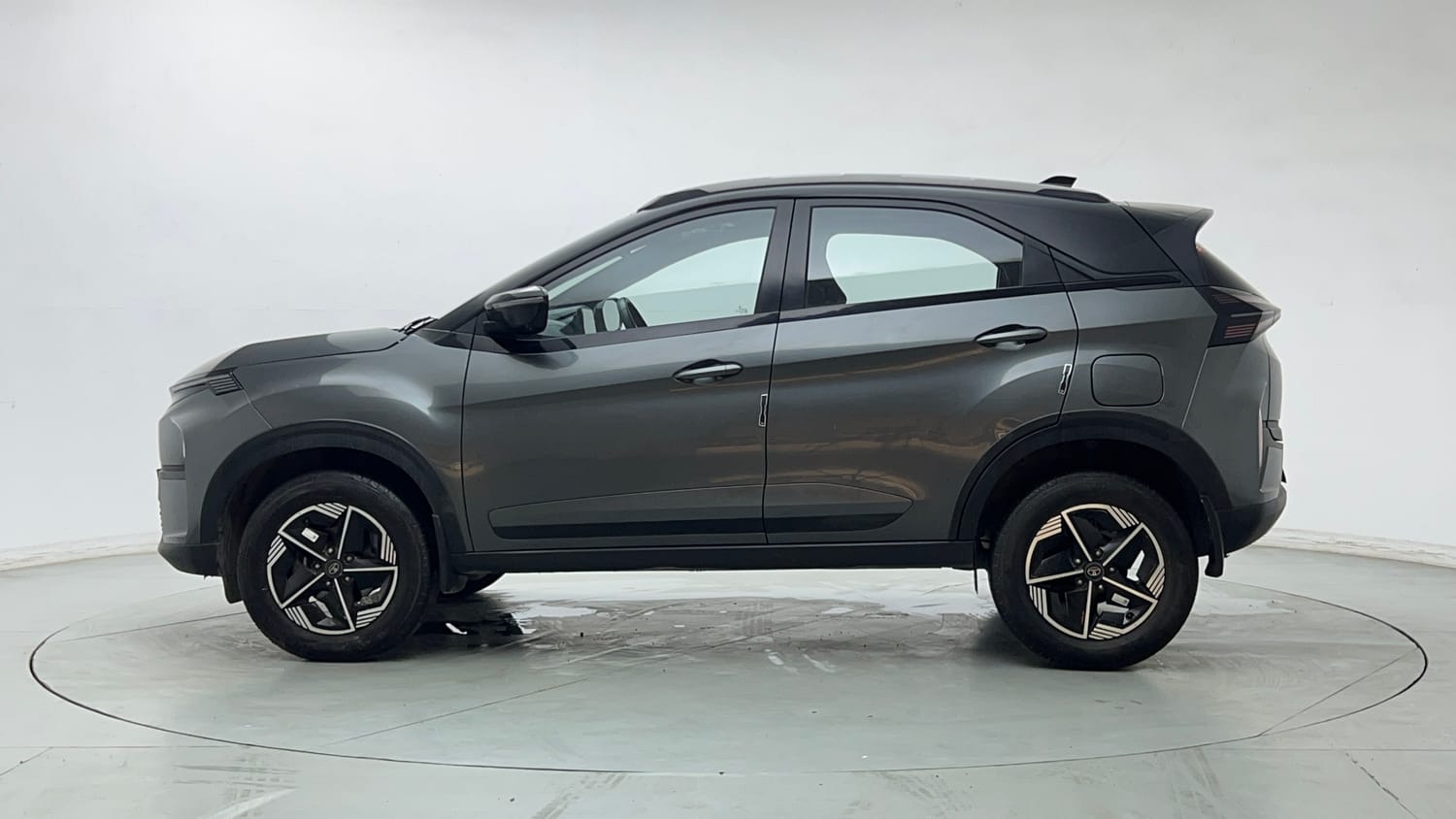 Used 2024 tata Nexon Fearless S 1.2 Revotron Petrol 7DCA Dual Tone Petrol Automatic exterior LEFT SIDE VIEW