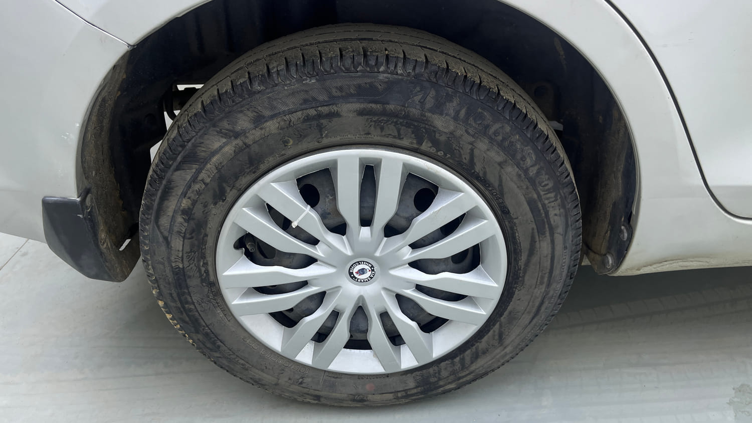 Used 2015 Maruti Suzuki Swift Dzire VXI Petrol Manual tyres RIGHT REAR TYRE RIM VIEW