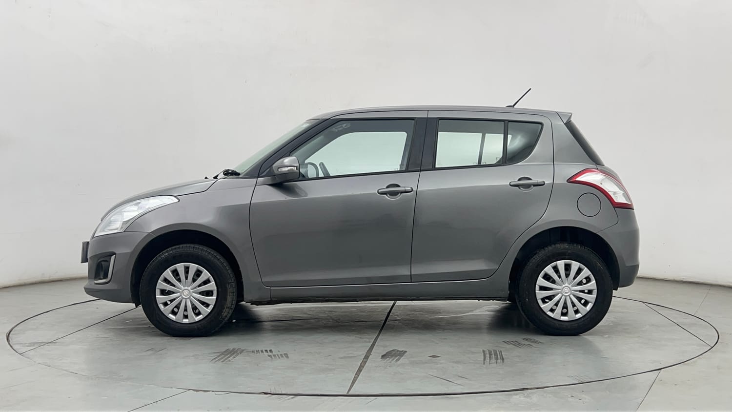 Used 2017 Maruti Suzuki Swift VXi Petrol Manual exterior LEFT SIDE VIEW