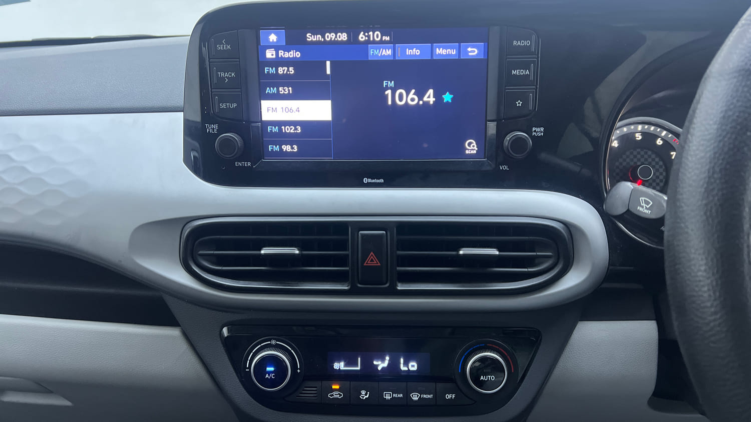 Used 2021 Hyundai Grand i10 Nios Sportz 1.2 Kappa VTVT Petrol Manual interior MUSIC SYSTEM & AC CONTROL VIEW