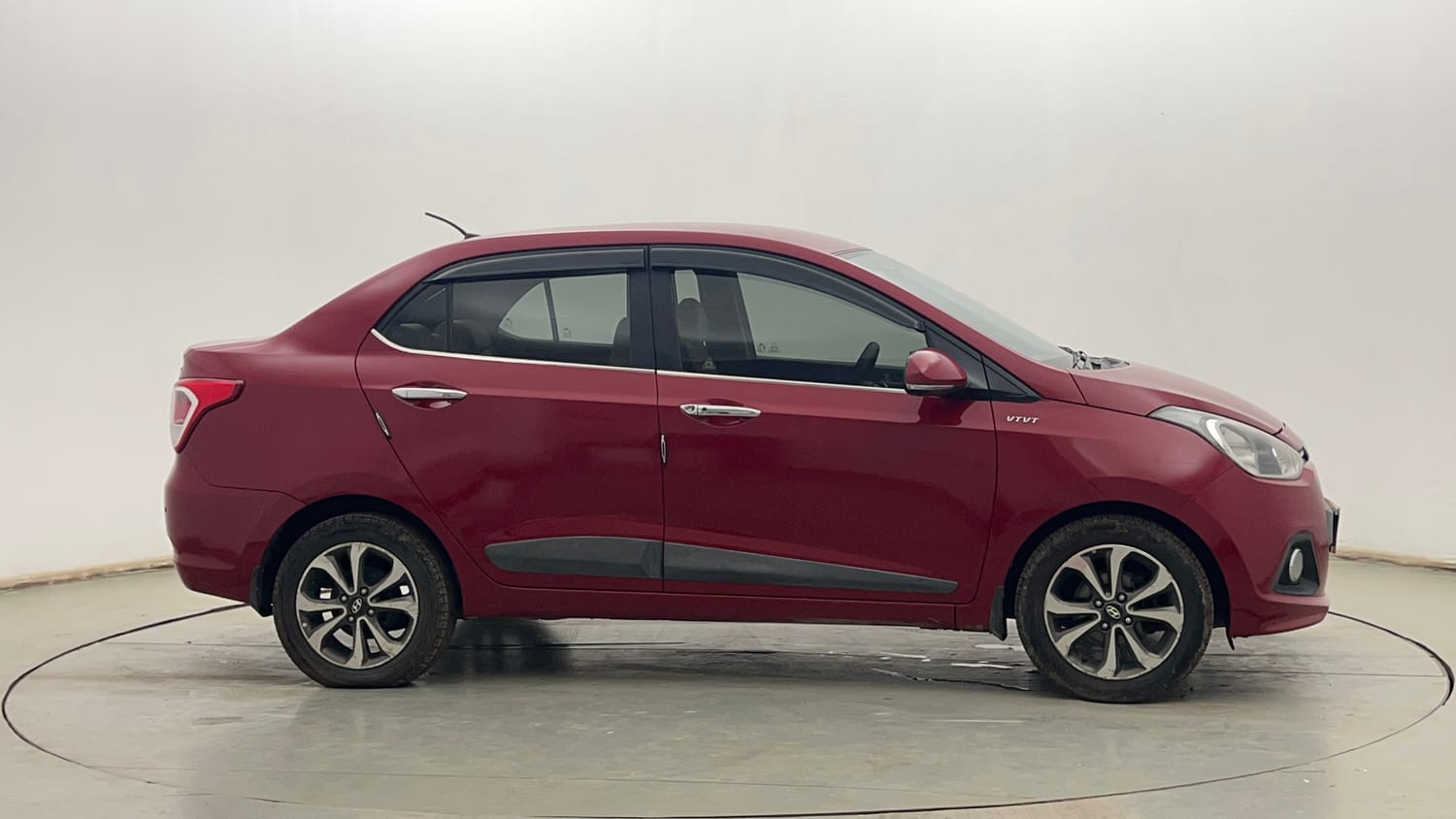 Used 2014 Hyundai Xcent SX 1.2 (O) Petrol Manual exterior RIGHT SIDE VIEW