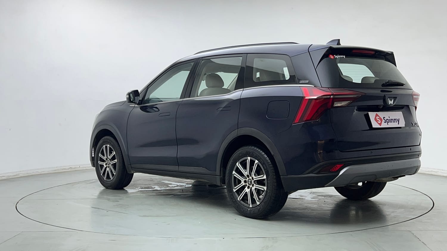 Used 2022 Mahindra XUV700 AX 7 Petrol MT 7 STR Petrol Manual exterior LEFT REAR CORNER VIEW