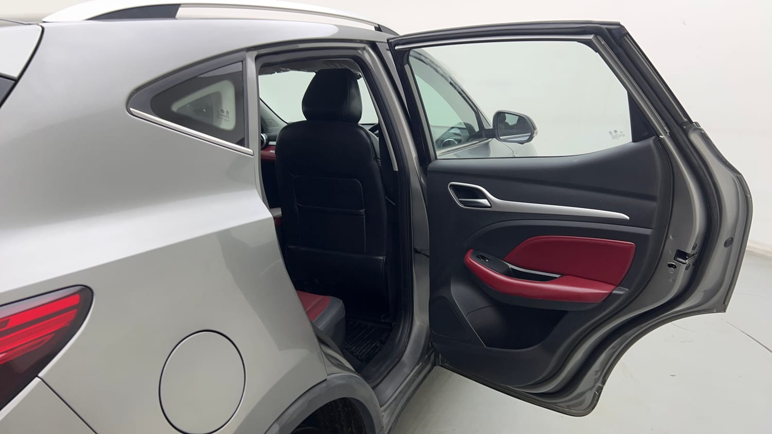 Used 2023 MG Motors Astor Savvy 1.3 Turbo AT S Red Petrol Automatic interior RIGHT REAR DOOR OPEN VIEW