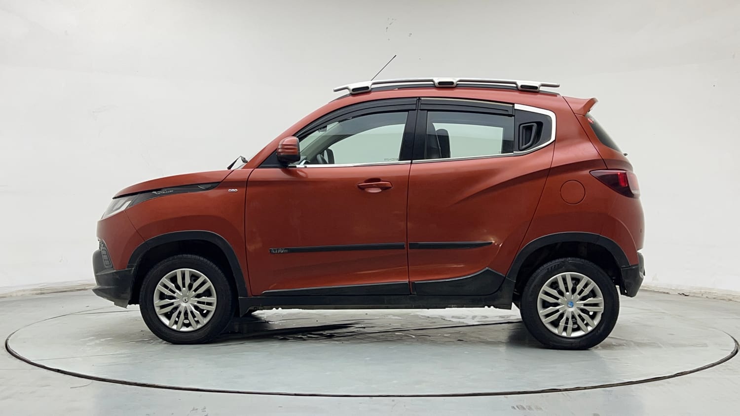 Used 2016 Mahindra KUV100 K6+ 6 STR Petrol Manual exterior LEFT SIDE VIEW