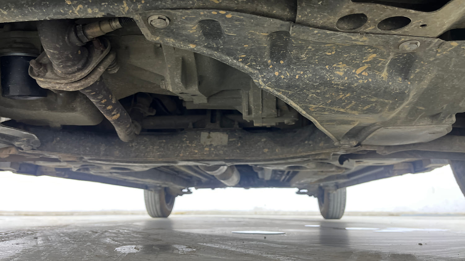 Used 2015 Maruti Suzuki Swift Dzire VXI Petrol Manual extra FRONT LEFT UNDERBODY VIEW