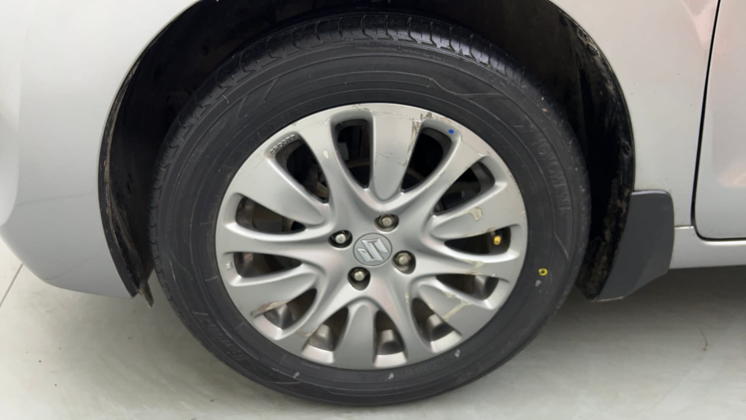 Used 2018 Maruti Suzuki Baleno Delta 1.2 Petrol Manual tyres LEFT FRONT TYRE RIM VIEW