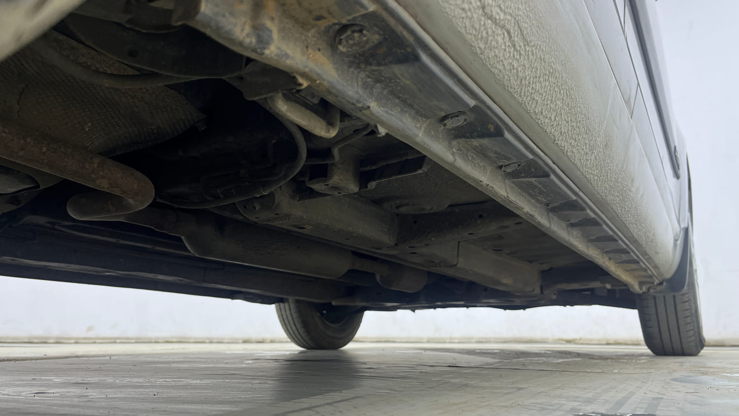 Used 2015 Maruti Suzuki Swift Dzire VXI Petrol Manual extra REAR RIGHT UNDERBODY VIEW