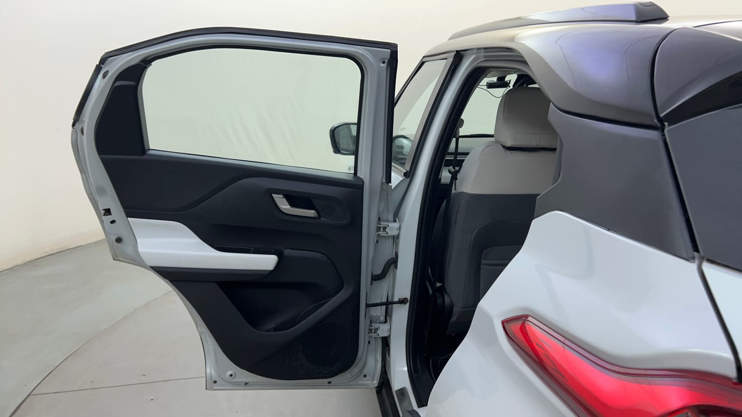 Used 2024 Tata Punch EV Empowered Plus S long Range 7.2 Fast Charger Electric Automatic interior LEFT REAR DOOR OPEN VIEW