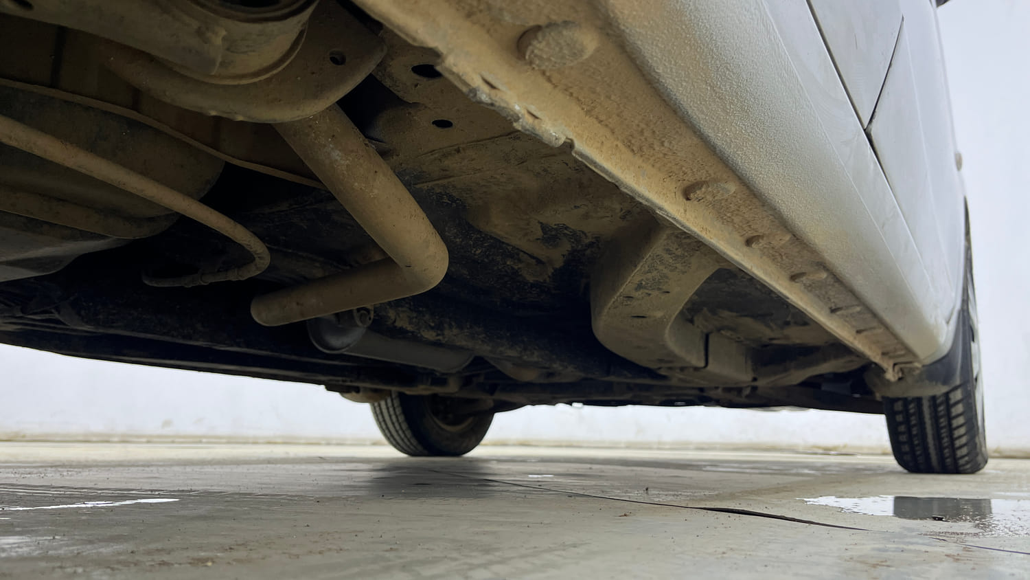 Used 2014 Honda Brio S MT Petrol Manual extra REAR RIGHT UNDERBODY VIEW