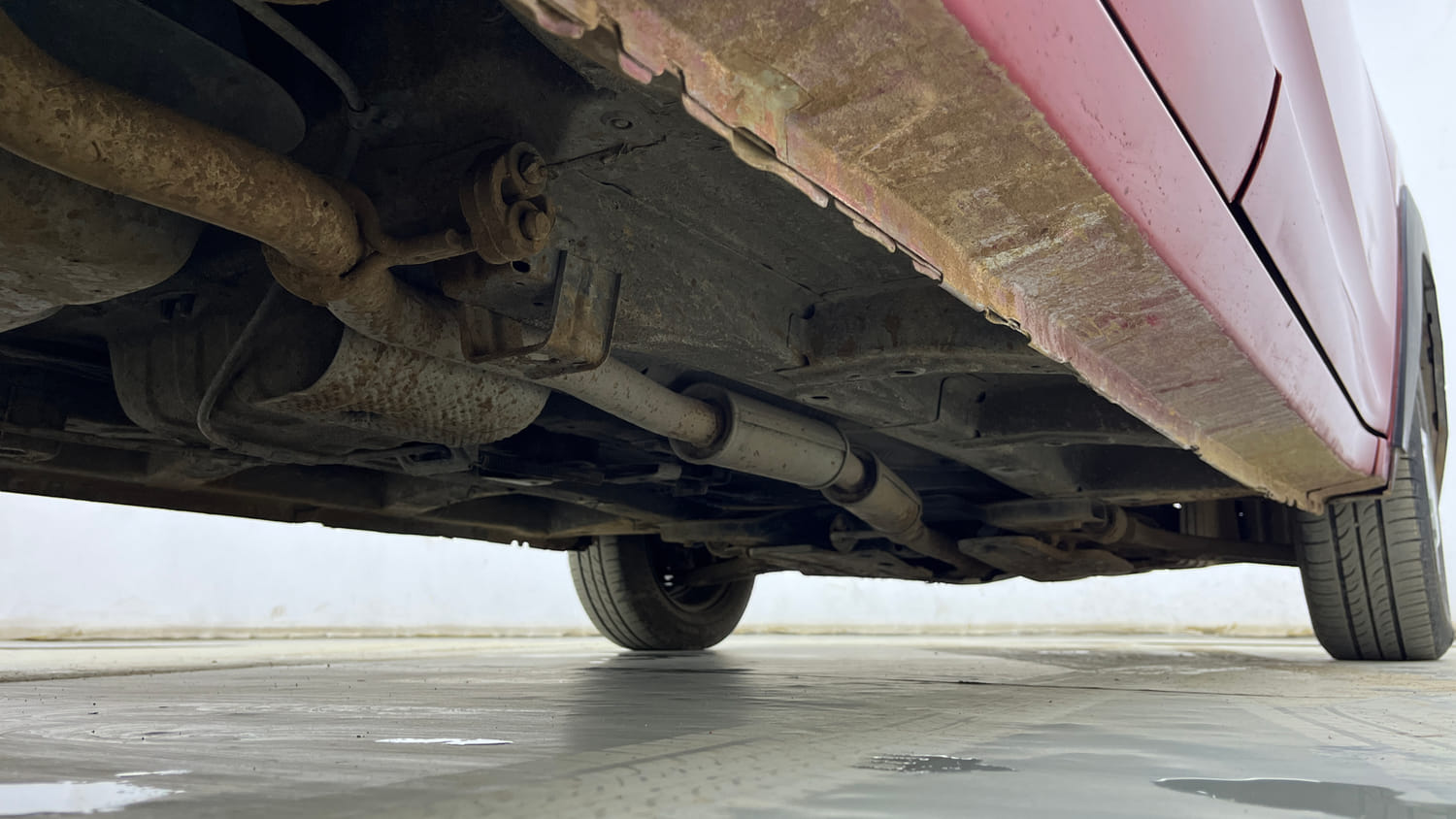 Used 2018 Mahindra KUV100 NXT K2 6 STR Petrol Manual extra REAR RIGHT UNDERBODY VIEW