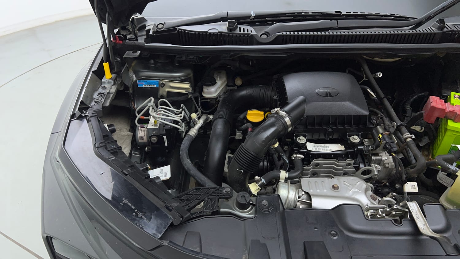 Used 2024 tata Nexon Fearless S 1.2 Revotron Petrol 7DCA Dual Tone Petrol Automatic engine ENGINE RIGHT SIDE VIEW