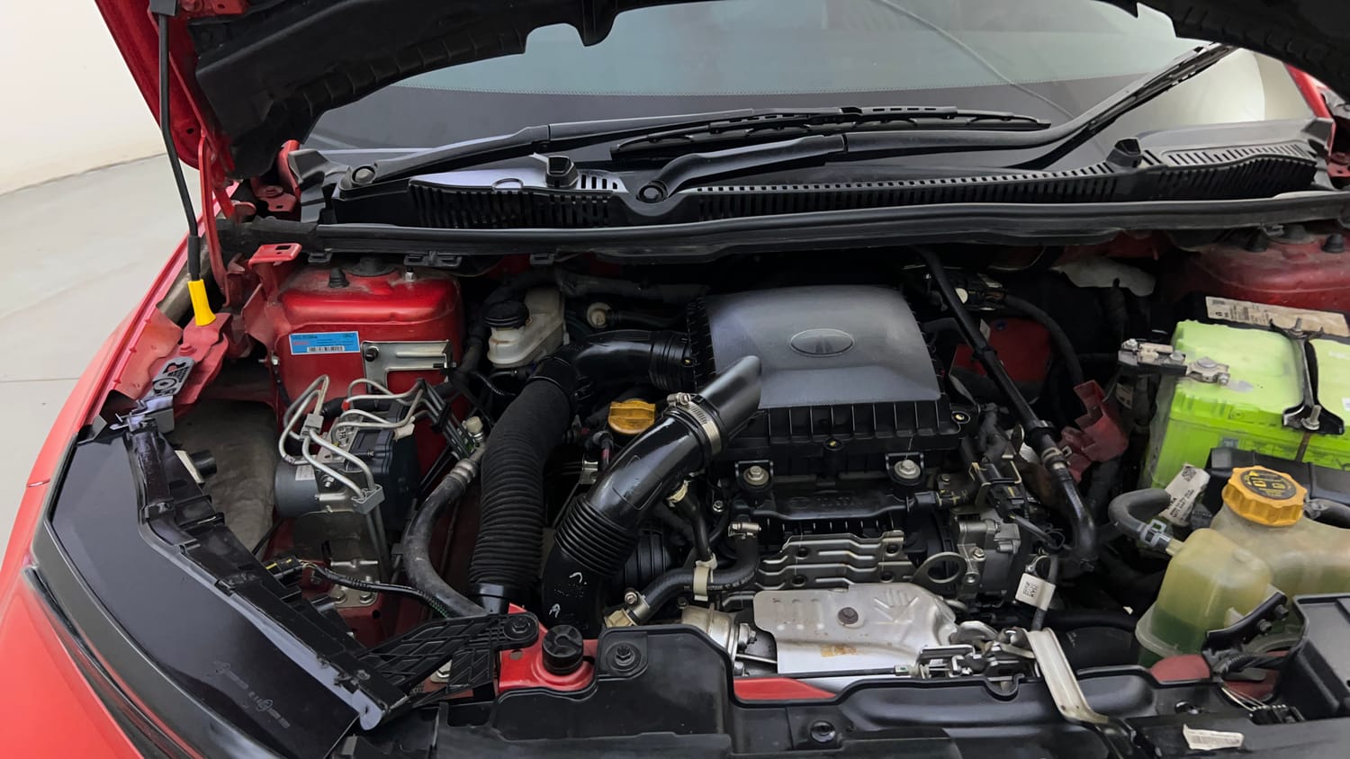 Used 2024 Tata Curvv Creative Plus S 1.2 Revotron Petrol 7DCA Petrol Automatic engine ENGINE RIGHT SIDE HINGE & APRON VIEW