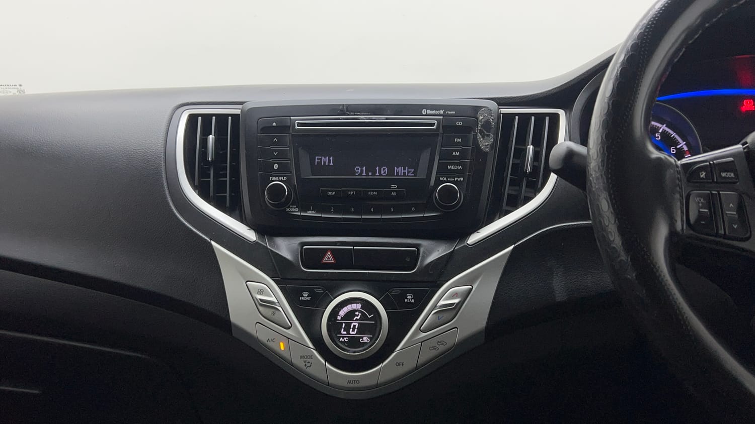 Used 2017 Maruti Suzuki Baleno Delta 1.2 Petrol Manual interior MUSIC SYSTEM & AC CONTROL VIEW