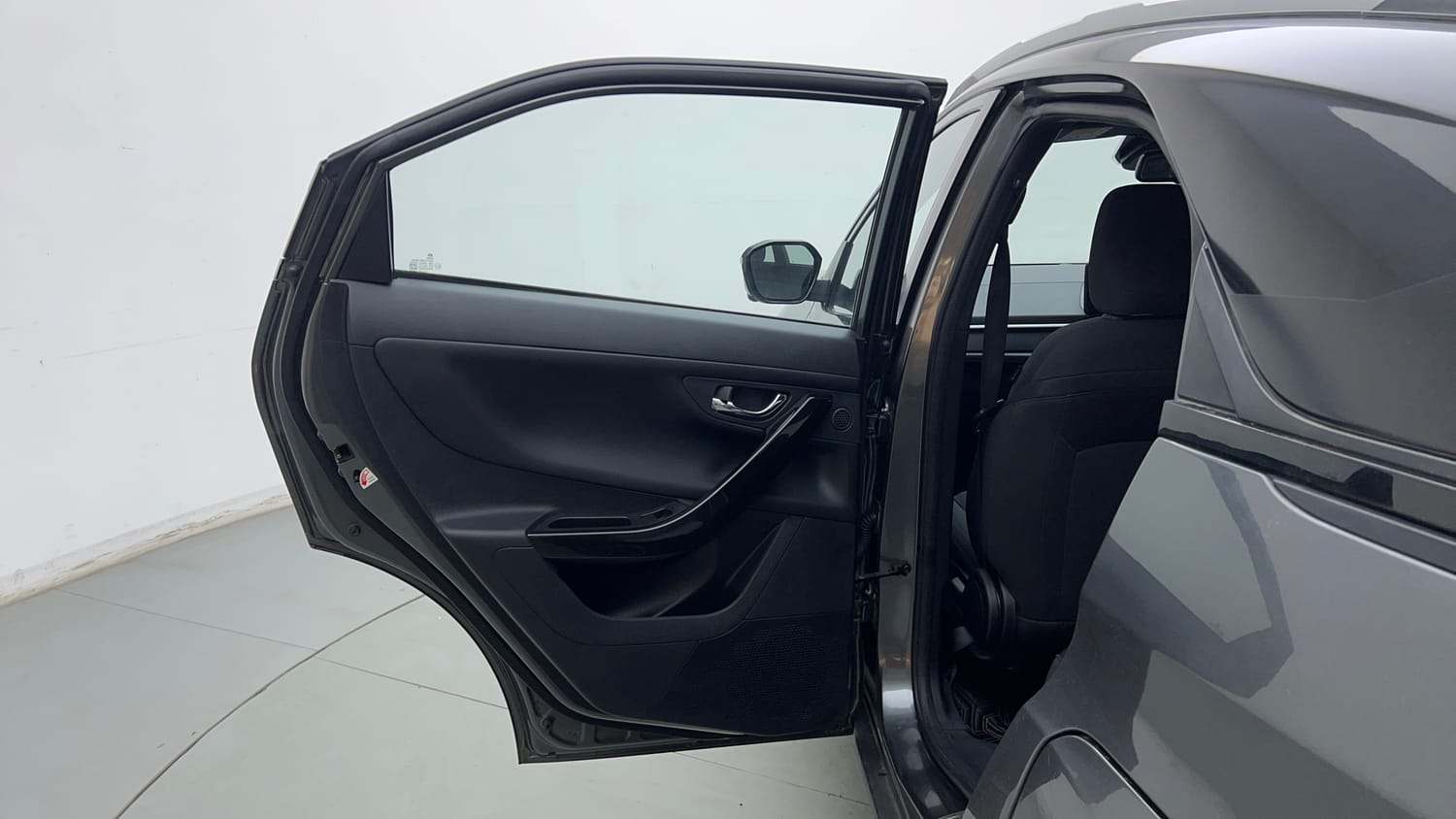 Used 2024 tata Nexon Fearless S 1.2 Revotron Petrol 7DCA Dual Tone Petrol Automatic interior LEFT REAR DOOR OPEN VIEW