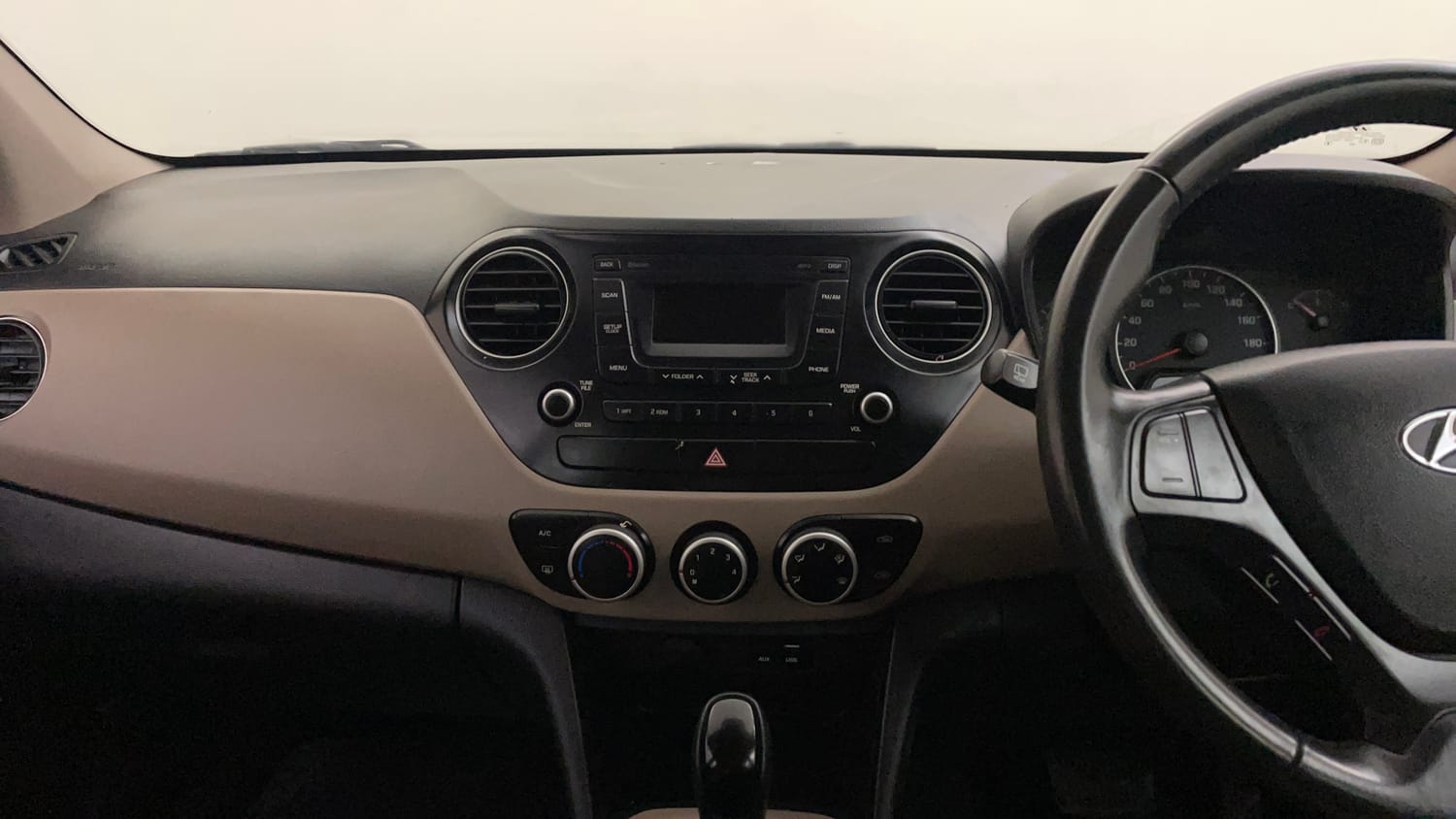 Used 2016 Hyundai Grand i10 Asta AT 1.2 Kappa VTVT (O) Petrol Automatic interior MUSIC SYSTEM & AC CONTROL VIEW