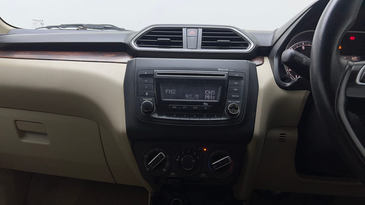 Used 2017 Maruti Suzuki Dzire VXi AMT Petrol Automatic top_features Integrated (in-dash) music system