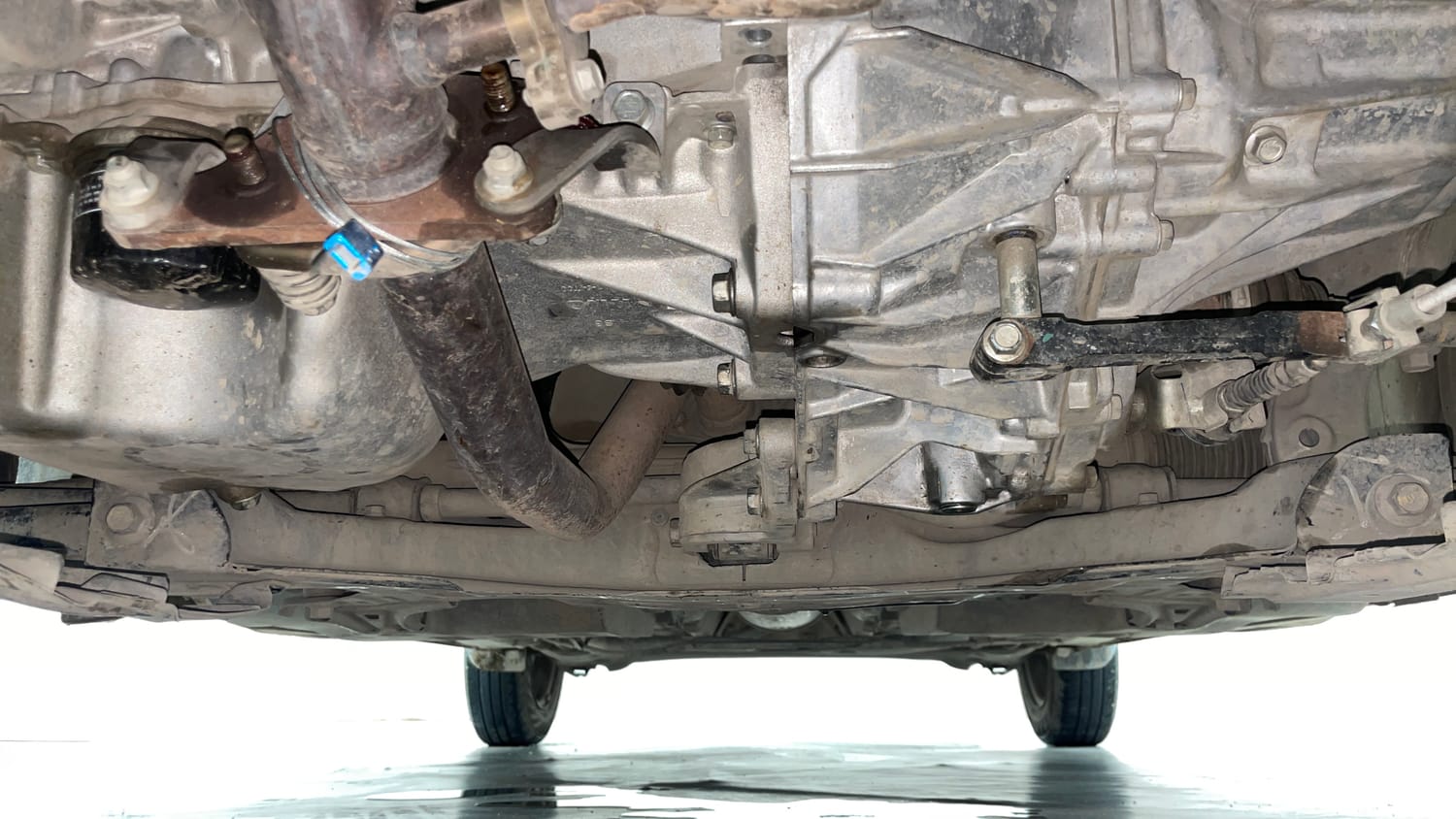 Used 2023 Maruti Suzuki Swift VXi Petrol Manual extra FRONT LEFT UNDERBODY VIEW
