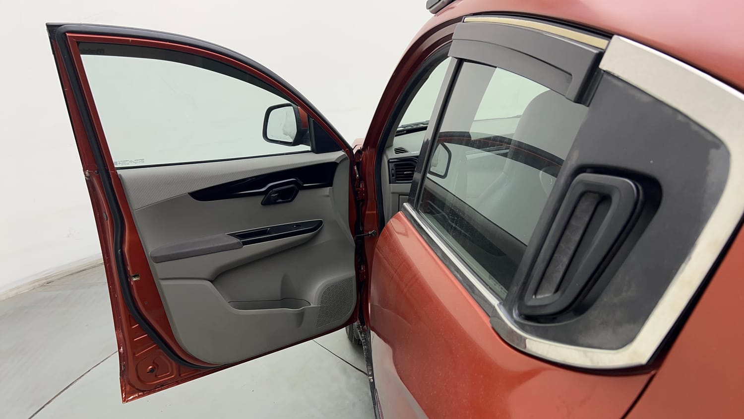Used 2016 Mahindra KUV100 K6+ 6 STR Petrol Manual interior LEFT FRONT DOOR OPEN VIEW